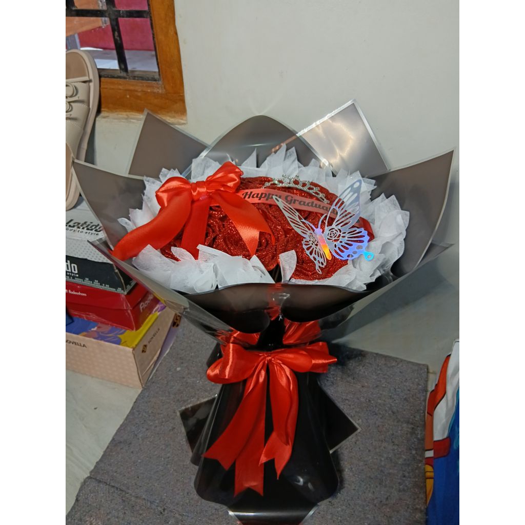 

Buket Jumbo pita satin merah Gliter 10 tangkai + mahkota + kupu-kupu + pita ucapan