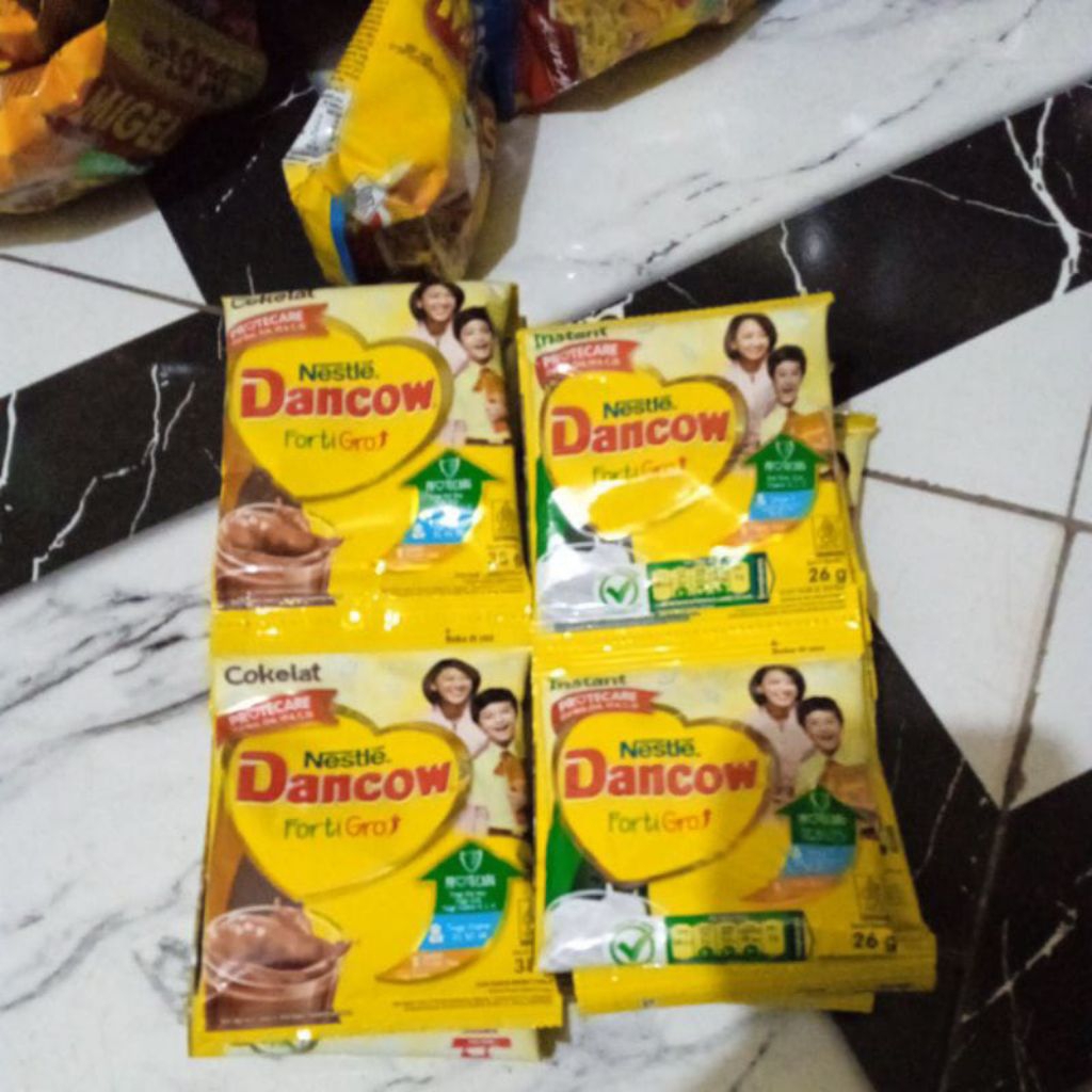 

susu dancow rcg isi 10