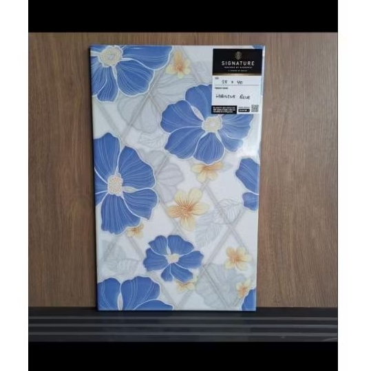 keramik dinding 25x40 Hibiscus blue glosy brand mulia signature
