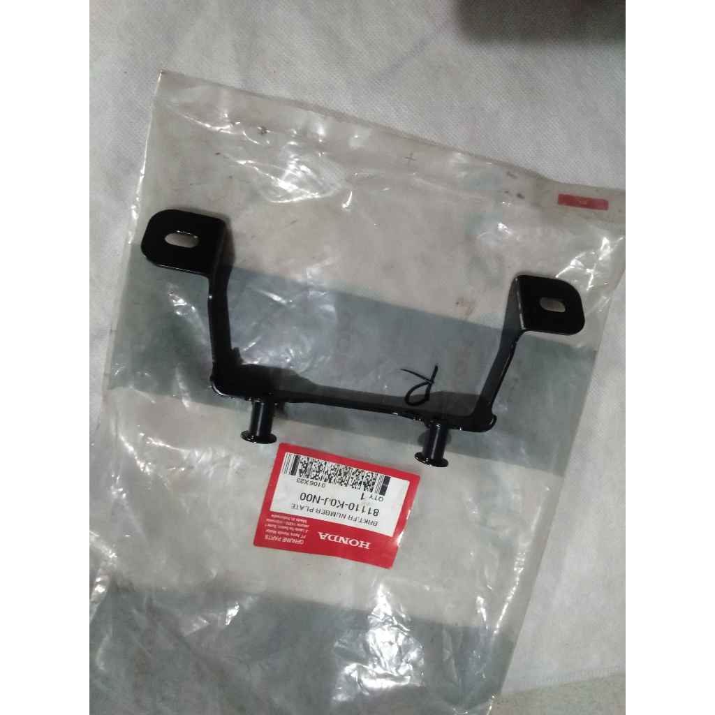 Dudukan Plat Nomer BRKT FR NUMBER PLATE GENIO 81110-K0J-N00 ORIGINAL