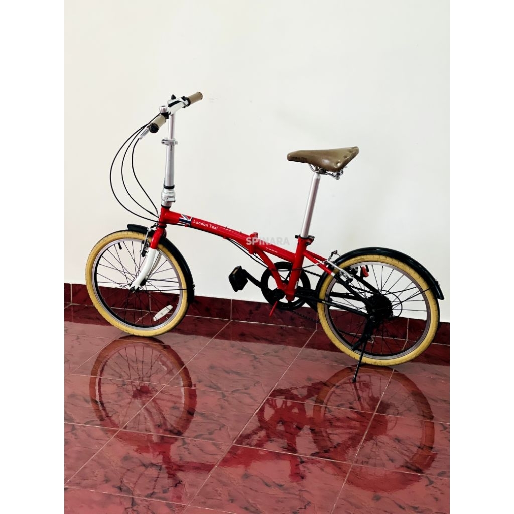 Sepeda lipat London taxi bekas kondisi mulus siap pakai