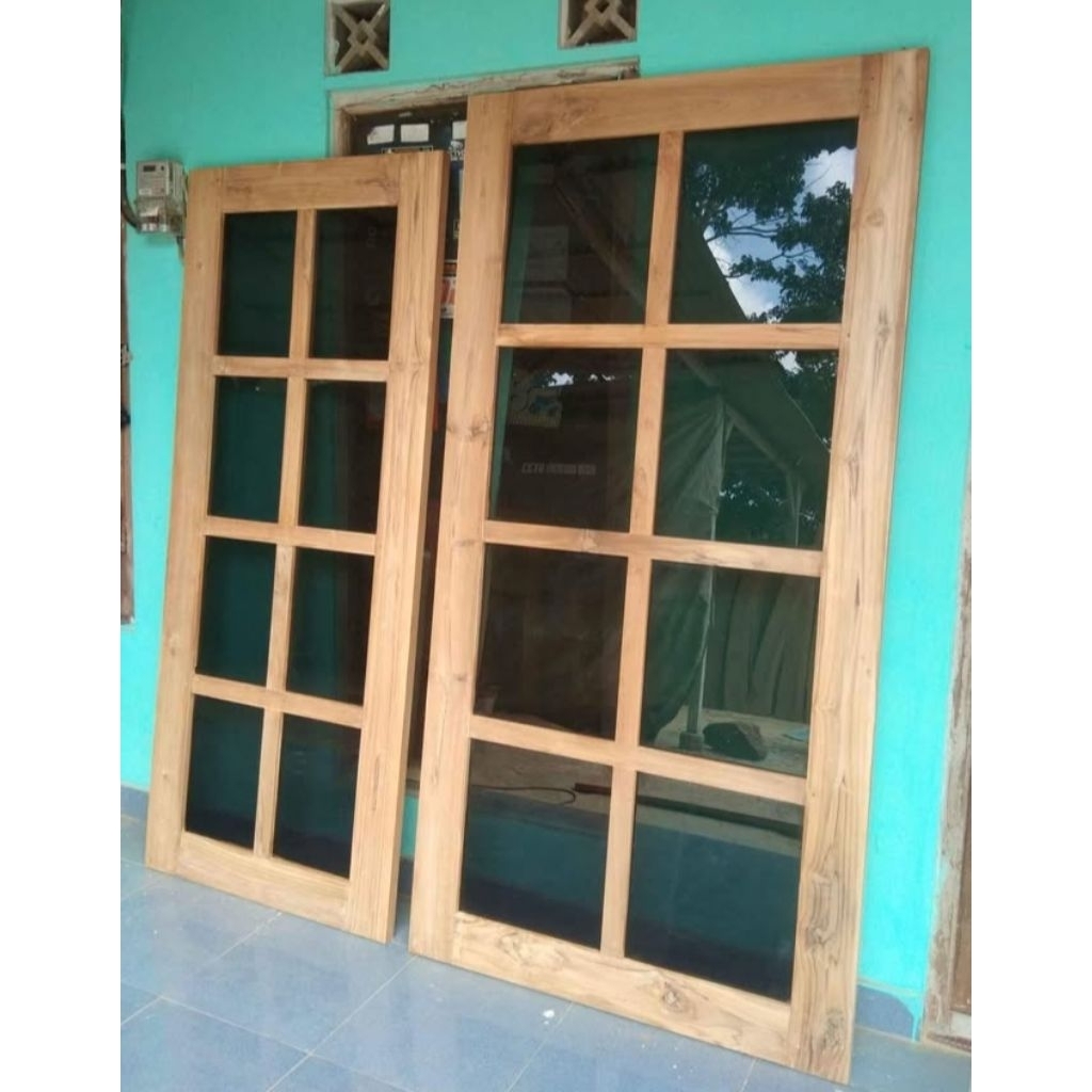 Daun jendela kaca kayu jati