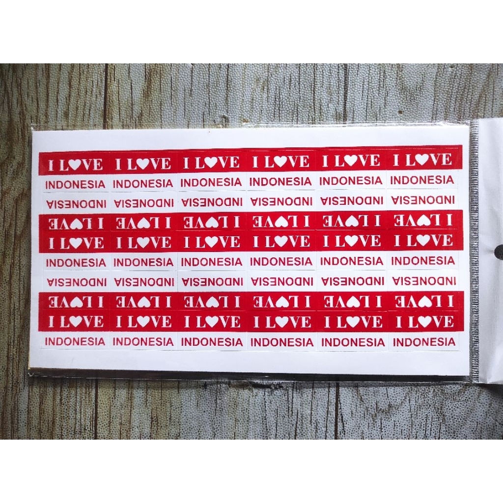 

stiker atau tato temporer bertema "I Love Indonesia" dengan desain hati berwarna merah.