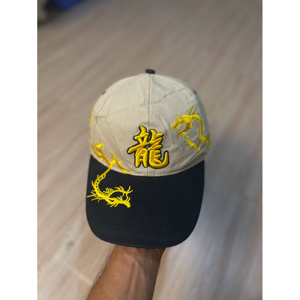 topi merk sukajan