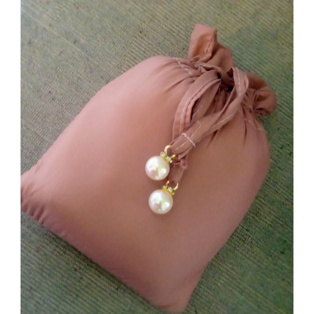 Mukena travel lasercut, parasut premium