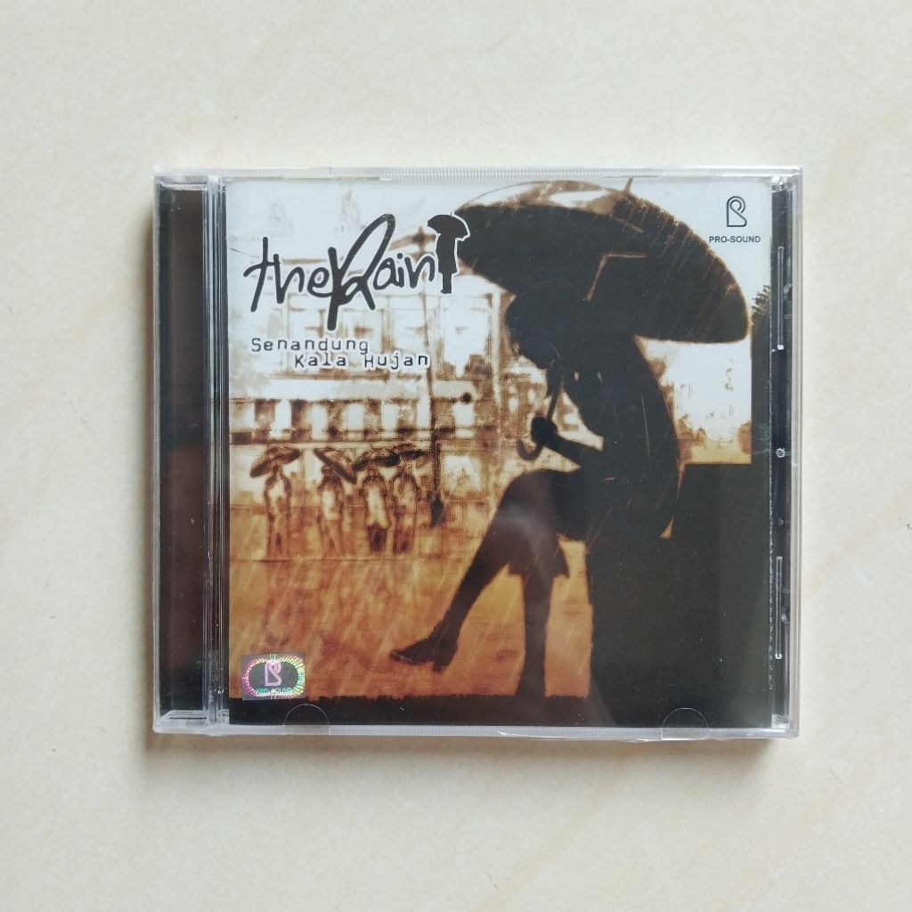 CD THE RAIN ALBUM SENANDUNG KALA HUJAN