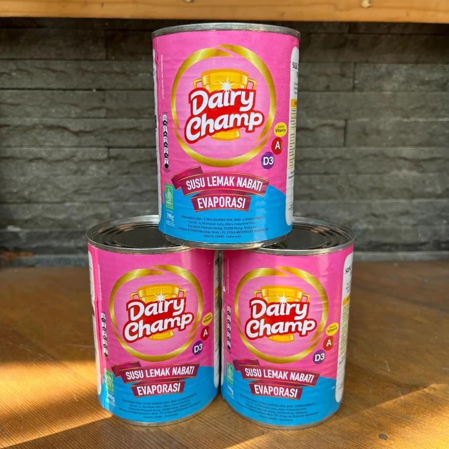 

Dairy Champ Susu Evaporasi - Susu Lemak Nabati DAIRY CHAMP 390gr