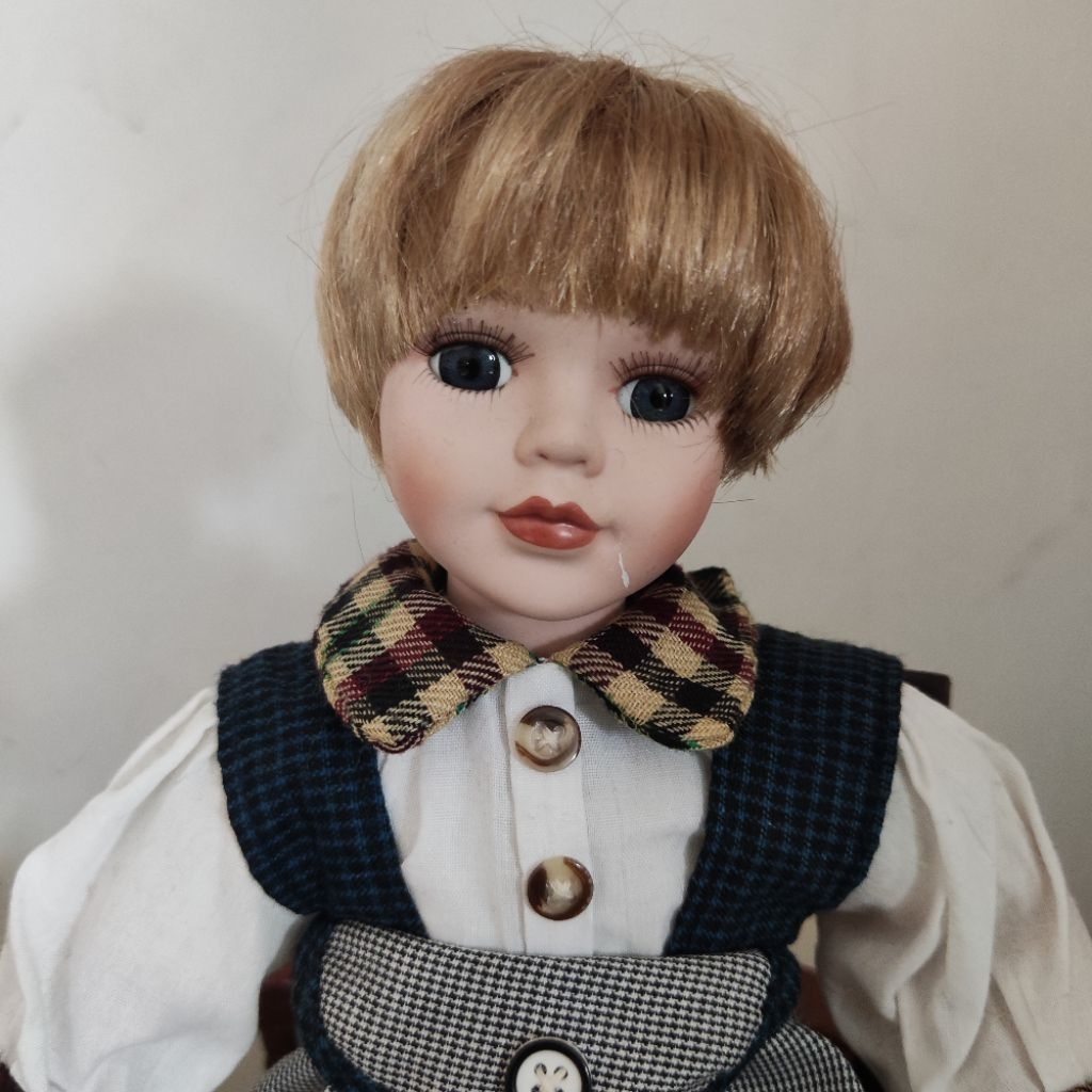Porcelain Boy Doll in Plaid Overalls and Buttoned Shirt with Classic Blond Hair. Boneka Anak Laki-La