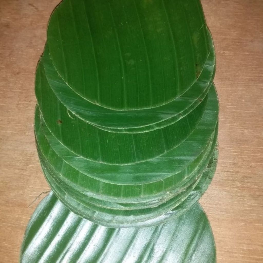

Daun pisang bulat segar 20 cm isi 30