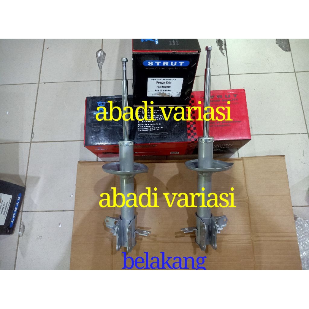 SHOCKBREAKER BELAKANG FCS AUTO MOBIL MAZDA FAMILIA/LANTIS 1995-1999 2PCS