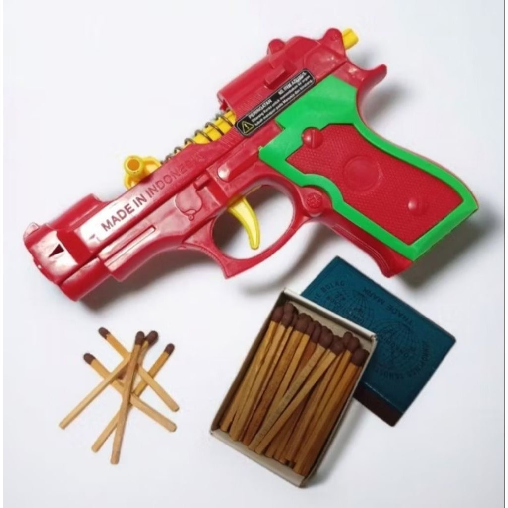 mainan pistol isi korek kayu