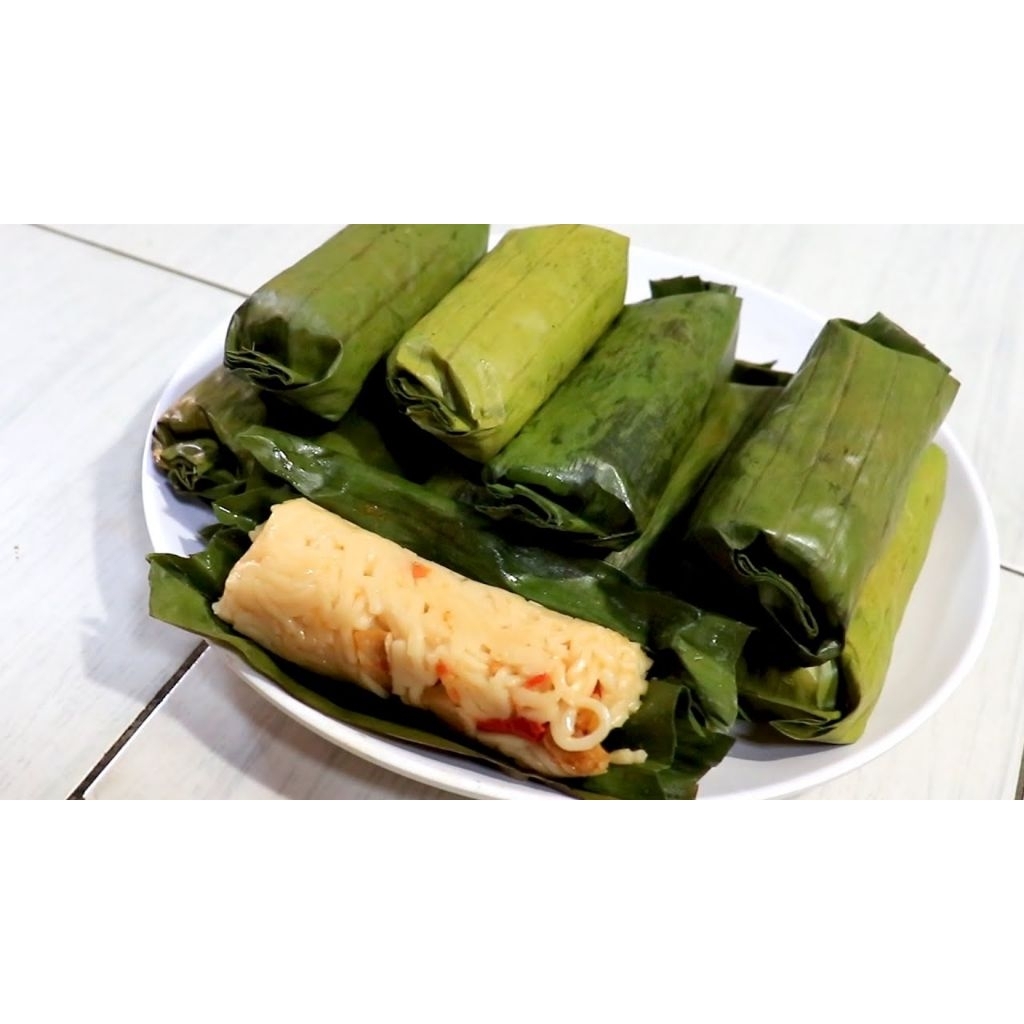 

Lontong mie ayam suwir 1 pac isi 10 pcs