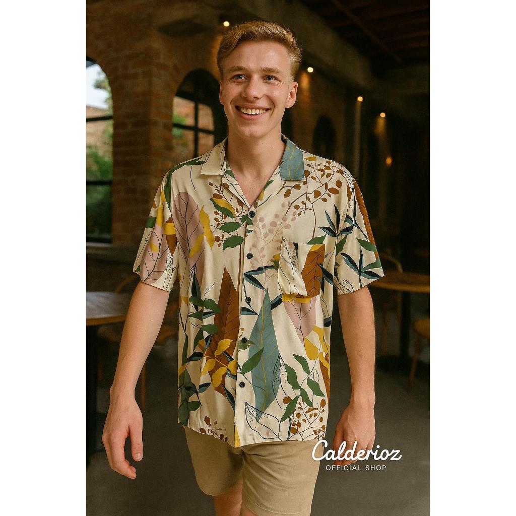 Calderioz - Kemeja Hawaii Motif Daun Tropis Dasar Cream Lengan Pendek Pria Wanita Outfit Santai