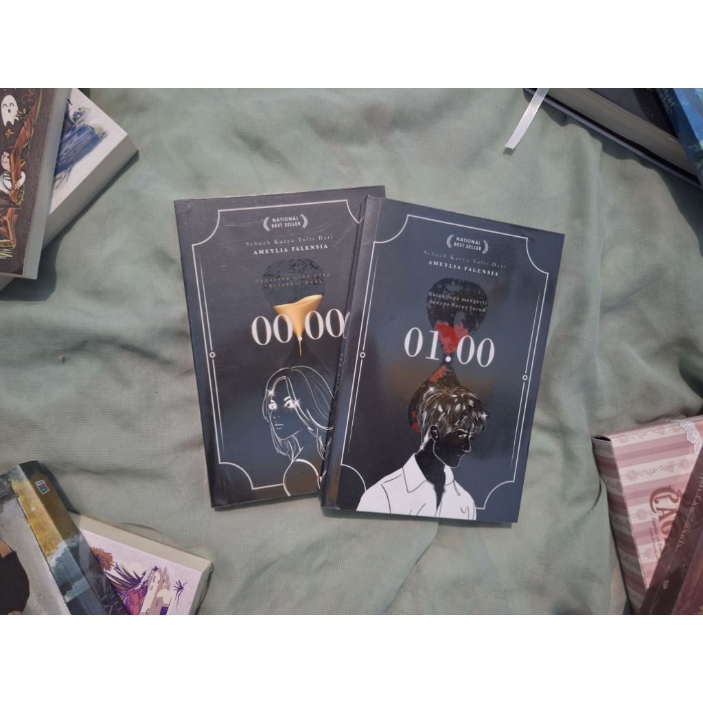 Preloved novel 00.00 dan 01.00 by Ameylia Falensia