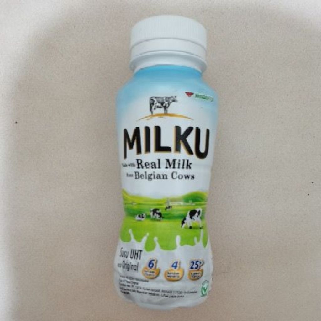 

MILKU. Made with Real Milk from Belgian Cows. Susu UHT rasa Original. Isi Bersih : 200ml.