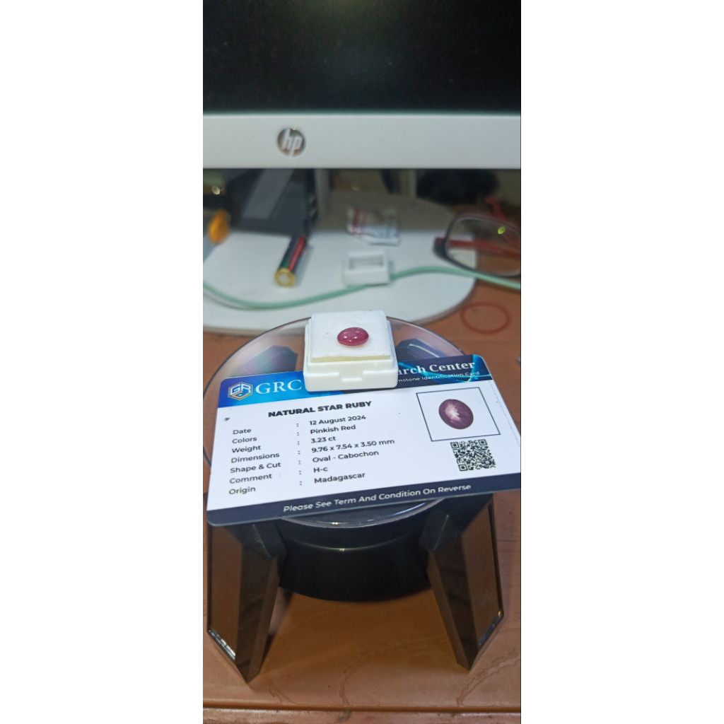 Natural star ruby with memo