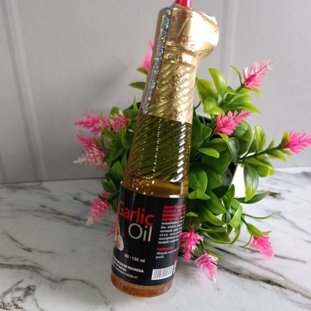 

Minyak Bawang/Garlic Oil 135ml Cap Matahari