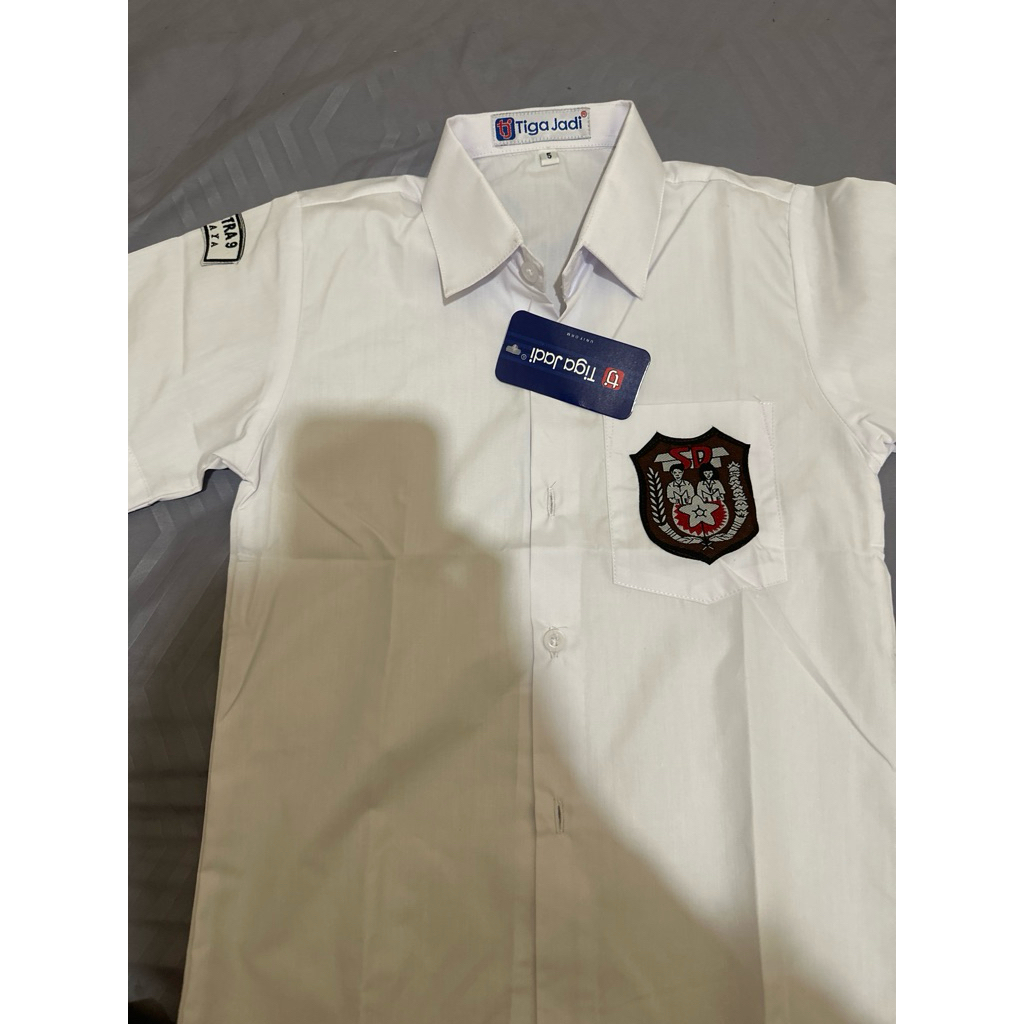 kemej seragam putih sd petra 9 surabaya new
