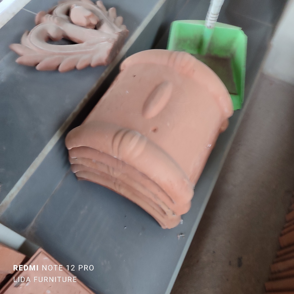 sambungan tengah buat wuwung atau kerpus kecil