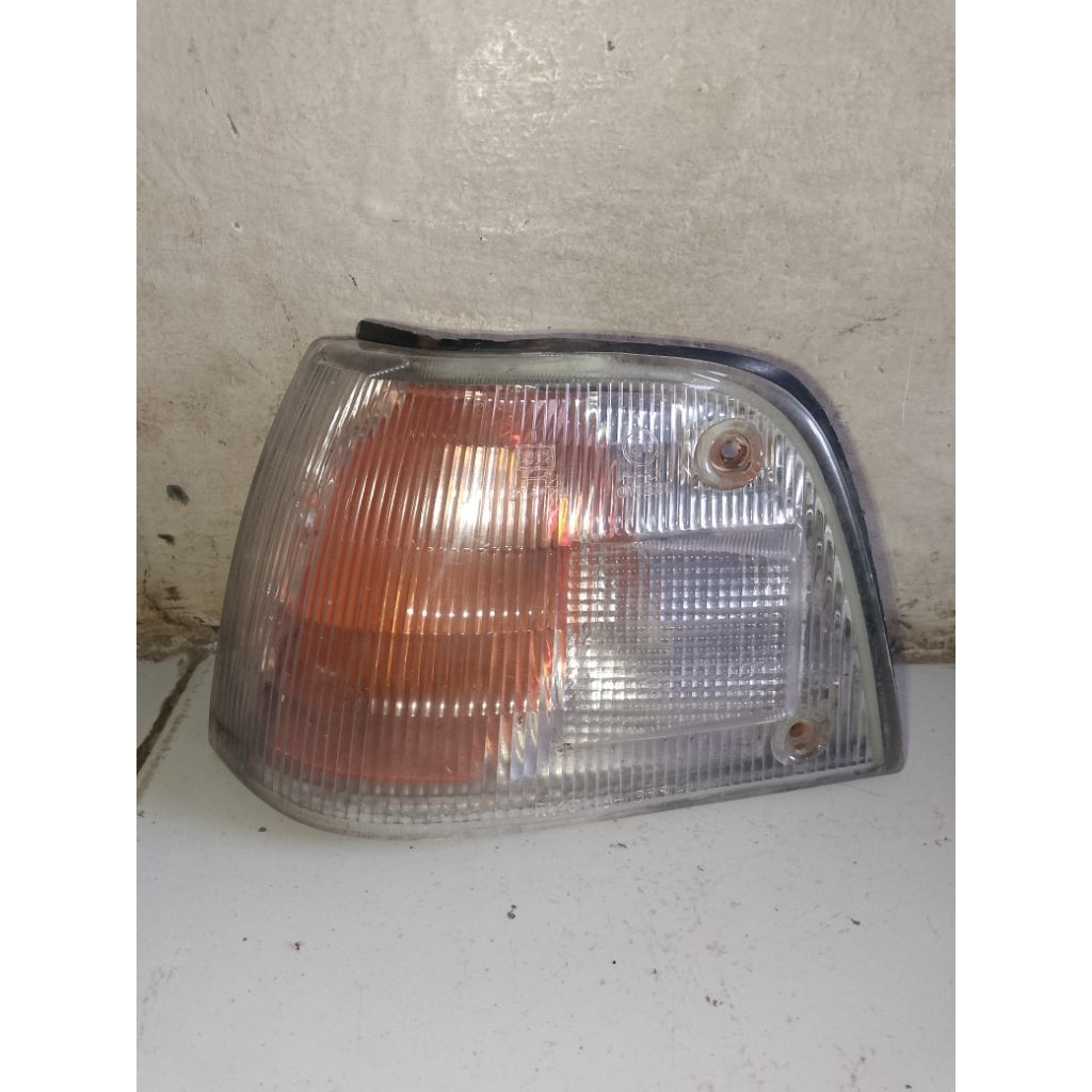 Lampu sen ford laser taxi merk tyc bagian kiri