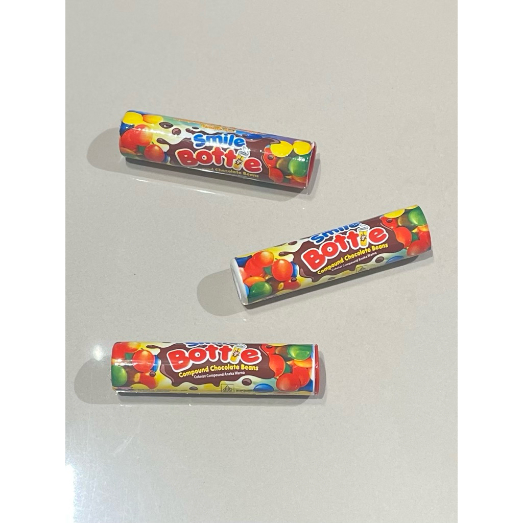 

COKELAT MARBLE ISI KACANG smile BOTOL