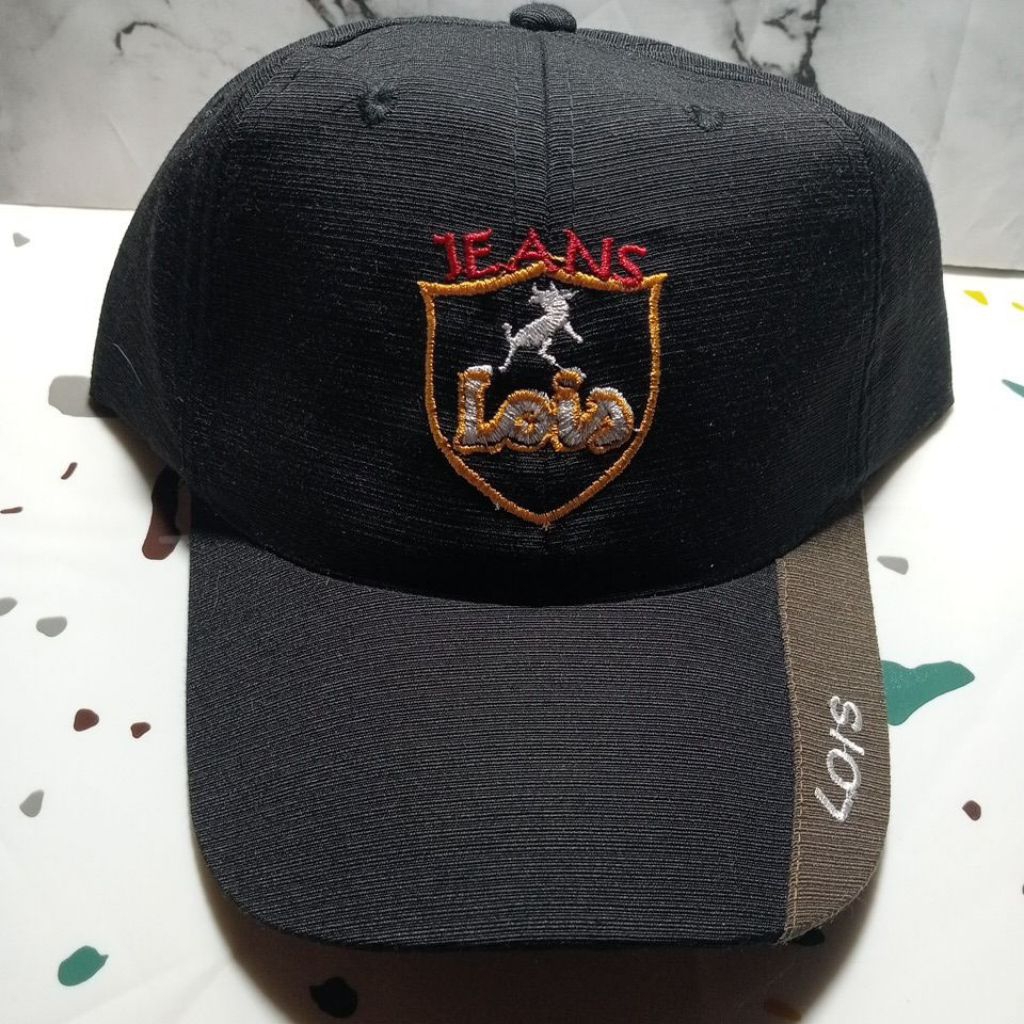 topi jean lois