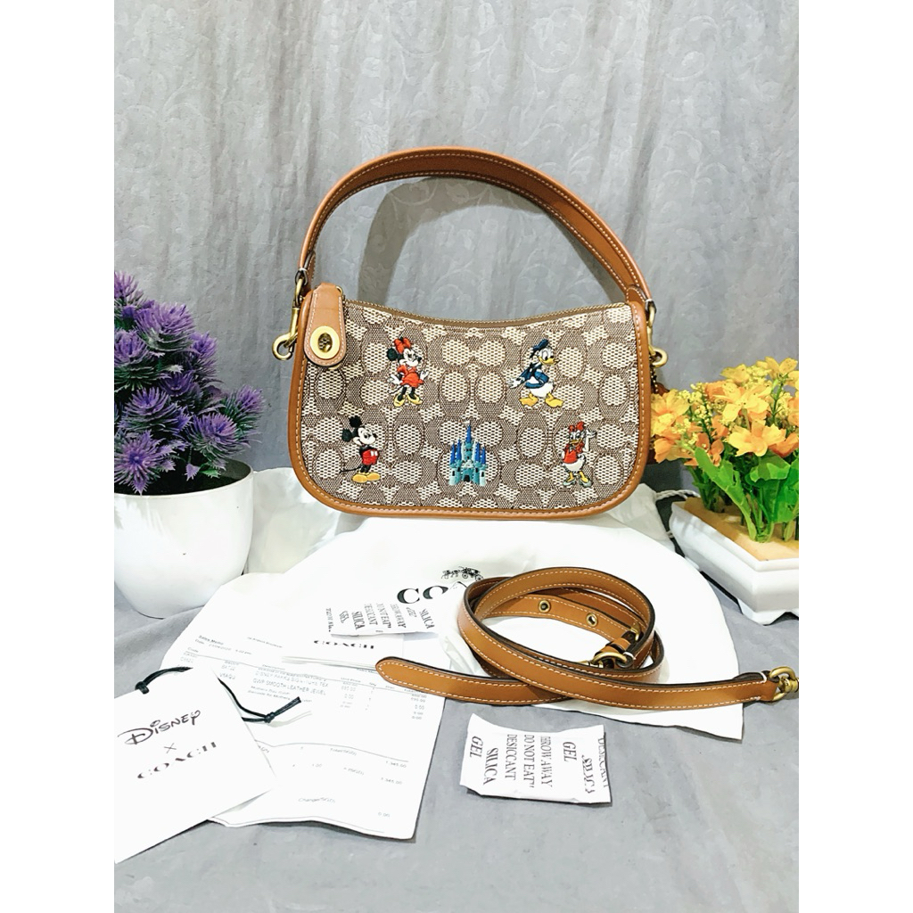 Coach swingger x  disney shoulder / slingbag