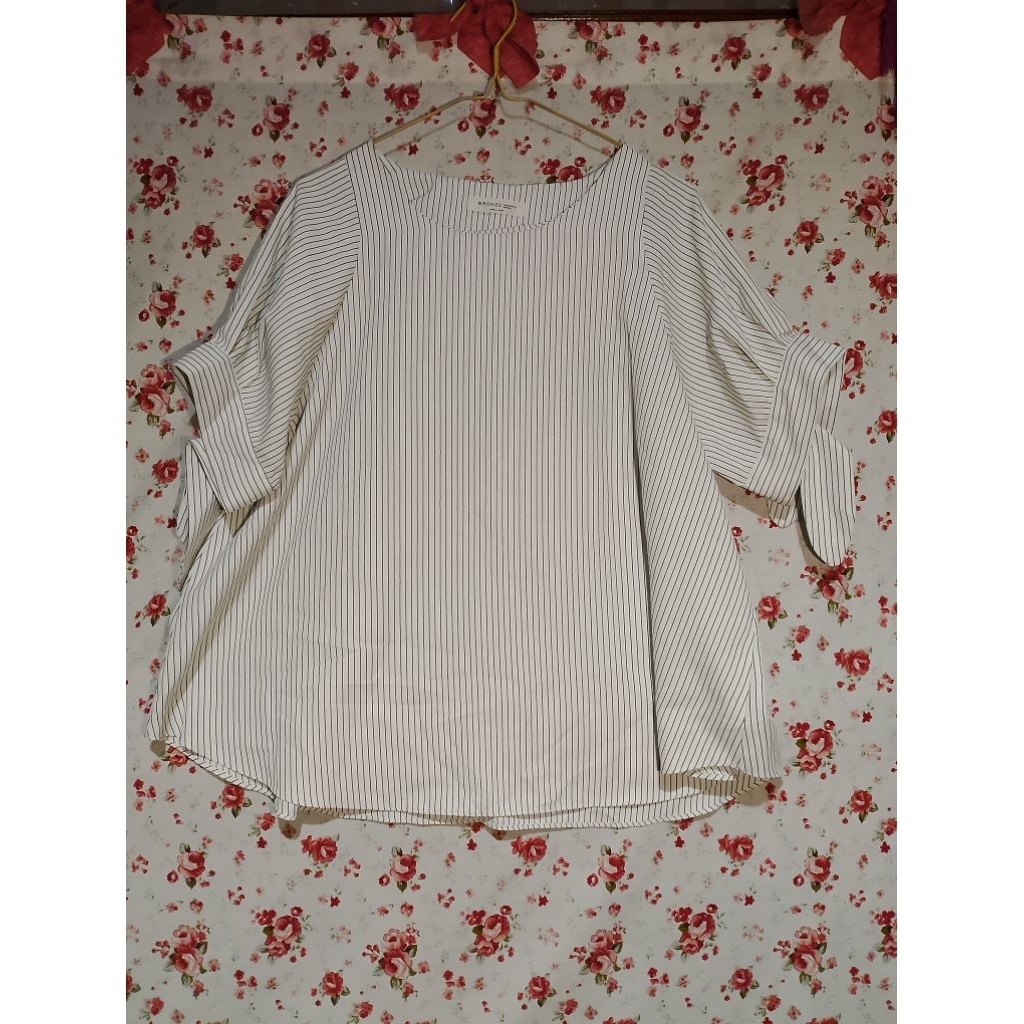 Baju atasan motif garis-garis