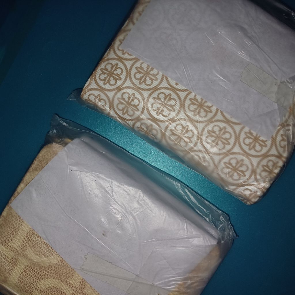 DOMPET LES CATINO MURAH