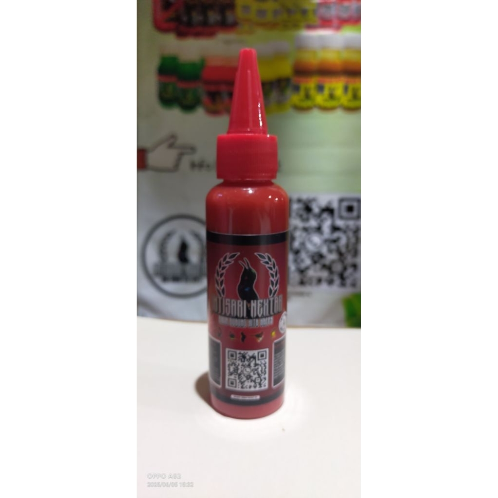 intisari nektar merah kemasan botol corong