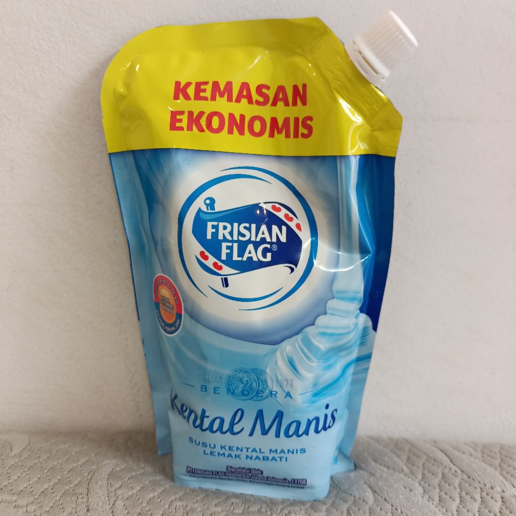

Frisian Flag susu Kental Manis putih 545 gram