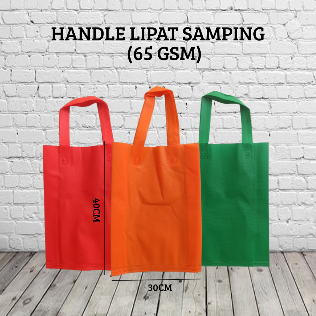 

Tas Goodie Bag uk 30x40 isi 12pcs Tas Tali Spunbond 65gsm