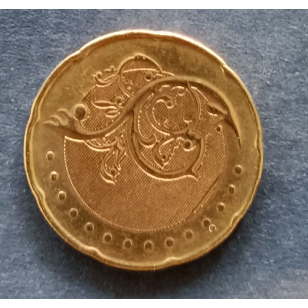 koin Malaysia 50 cent (kuning) tahun 2012..