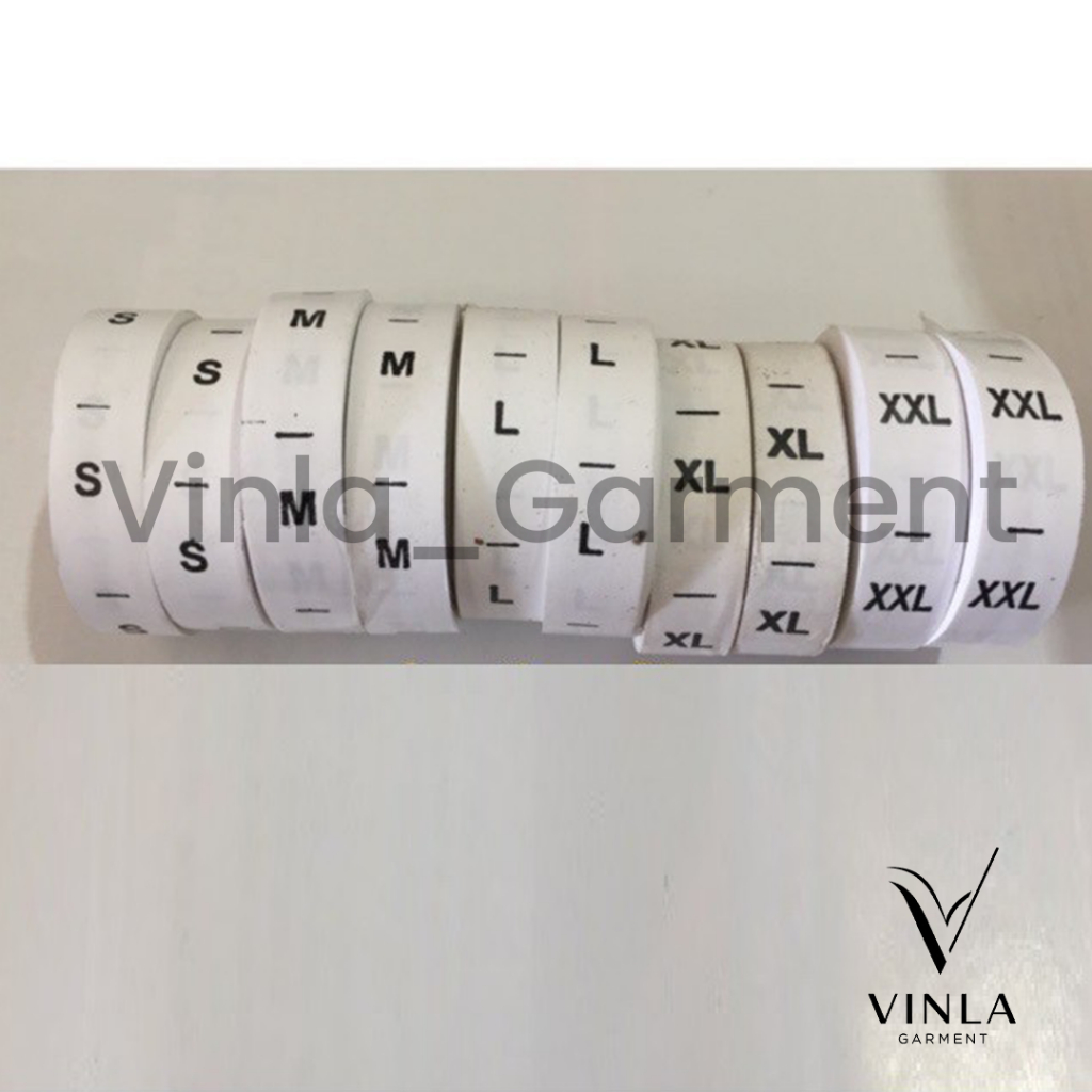 

Pita Label Size Sablon 50 roll = 15000pcs, huruf sablon putih XS, S, M, L, XL, XXL, XXXL