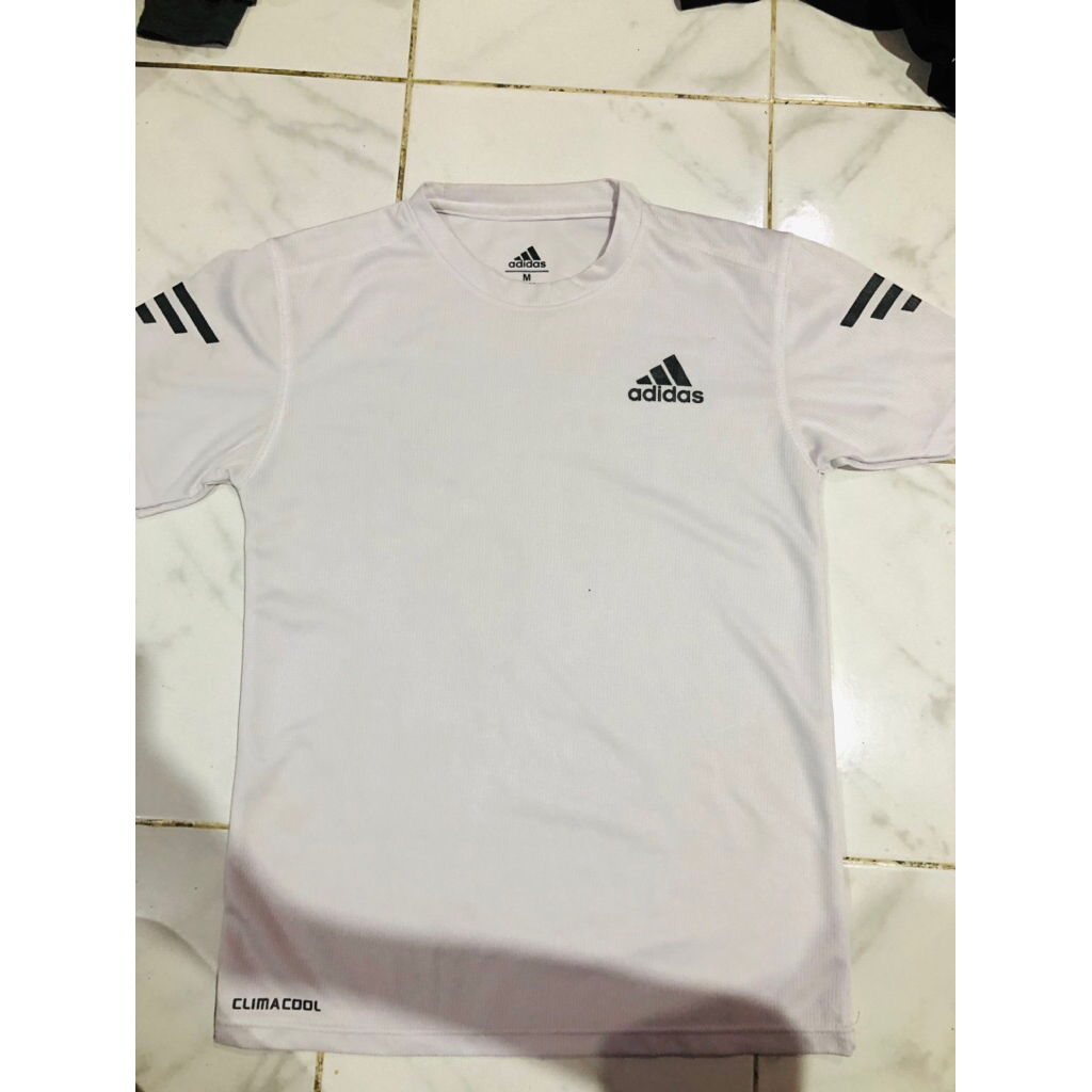 kaos olahraga adidas, under armour, puma