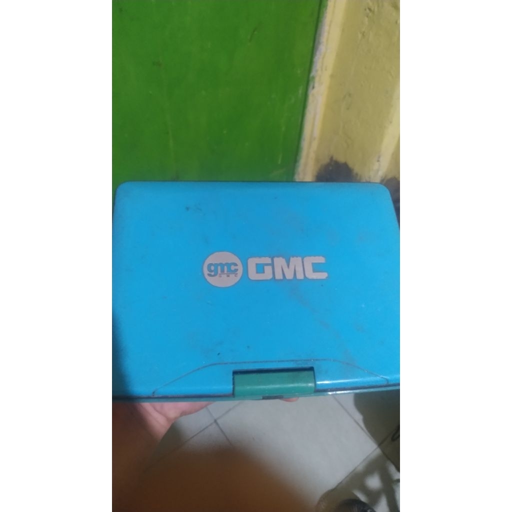 dvd portabel merek gmc