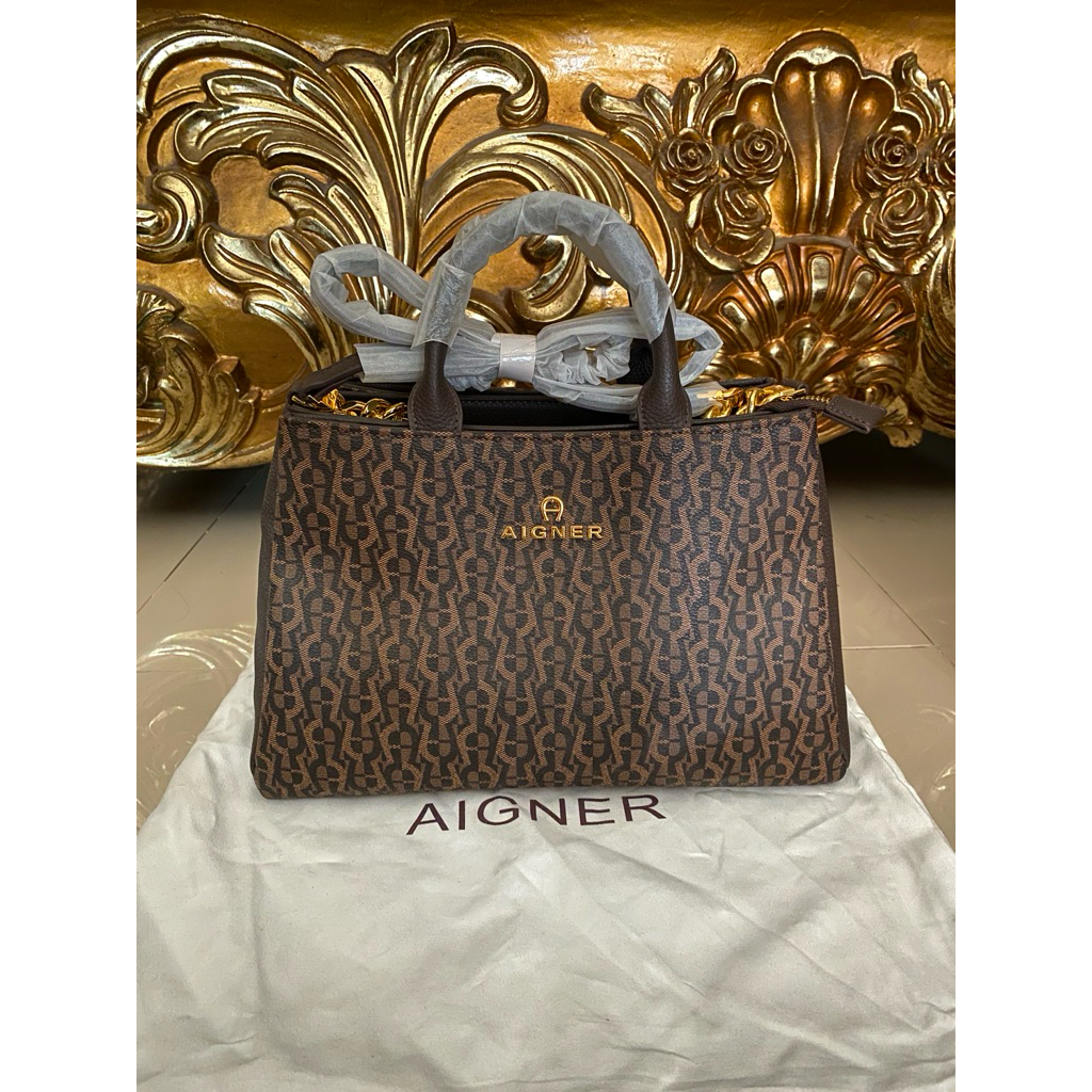 tas aigner modelista