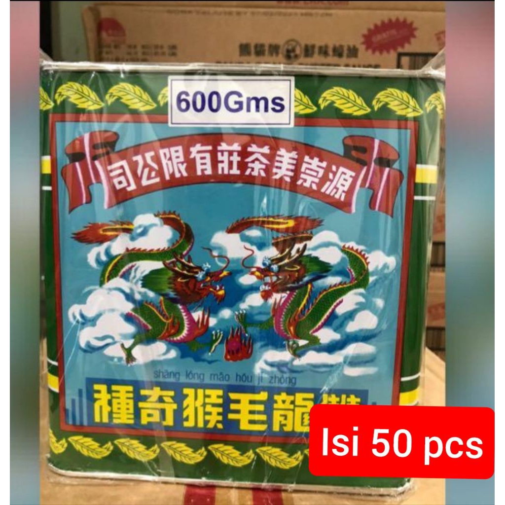 

1 kaleng 50 pcs. Daun teh pek mo kau / cap dua naga / liong cha