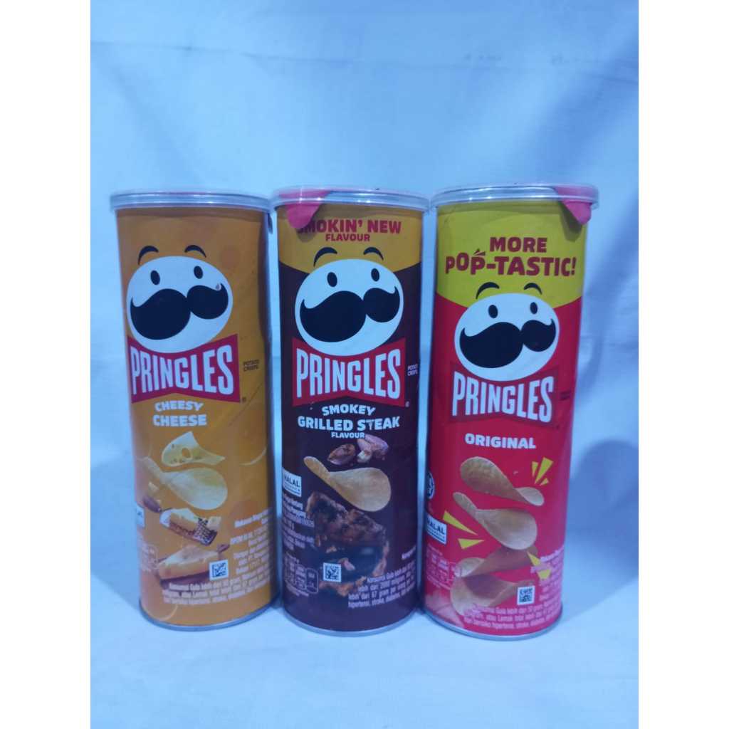 

makanan ringan PRINGLES MORE POP-TASTIC! cheesy-smokey grilled steak-original