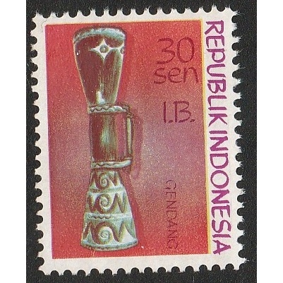 A 12162 SATU BUAH PRANGKO NOMINAL 30 SEN TEMA GENDANG CETAK TINDIH I.B. IRIAN BARAT DENGAN KONDISI B