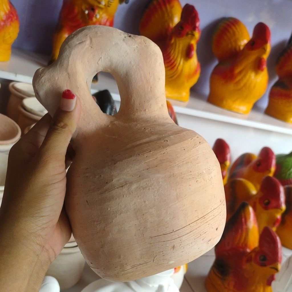 kendi rumah / kendi bubungan