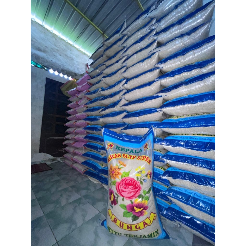 

BERAS CAP BUNGA ANGGUR DAN BADER