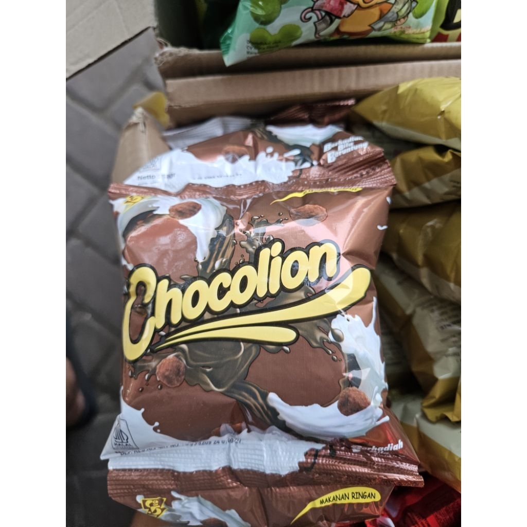 

CHOCOLION SNACK BERHADIAH UANG TUNAI SNACK JAGUNG COKLAT 1RTG 10PCS Food Cokelat Kering