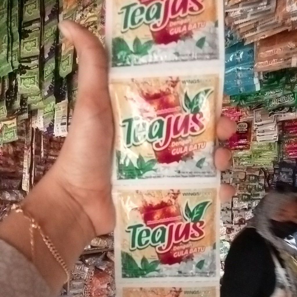 

TeaJus - 1 renceng isi 10 sachet