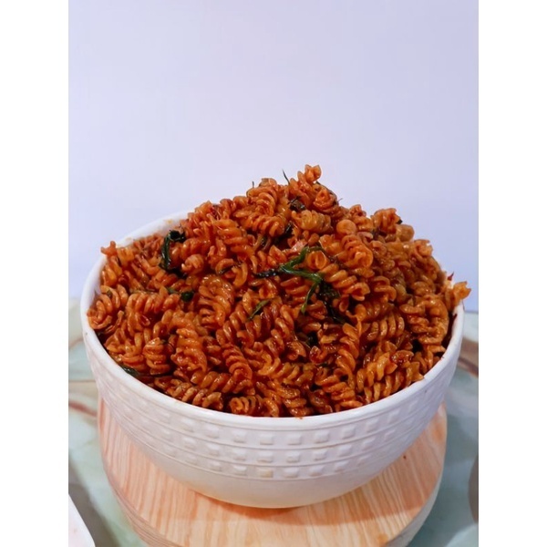 

MAKARONI SPIRAL - SNACK MAKARONI SPIRAL CIKRUH PEDAS DAUN JERUK PASTI SNACK