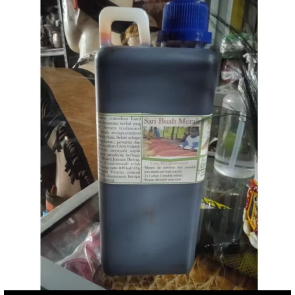 

sari buah merah/buah merah papua/obat herbal/obat kolestero/obat kanker/sari buah merah asli papua/kemasan 1 liter