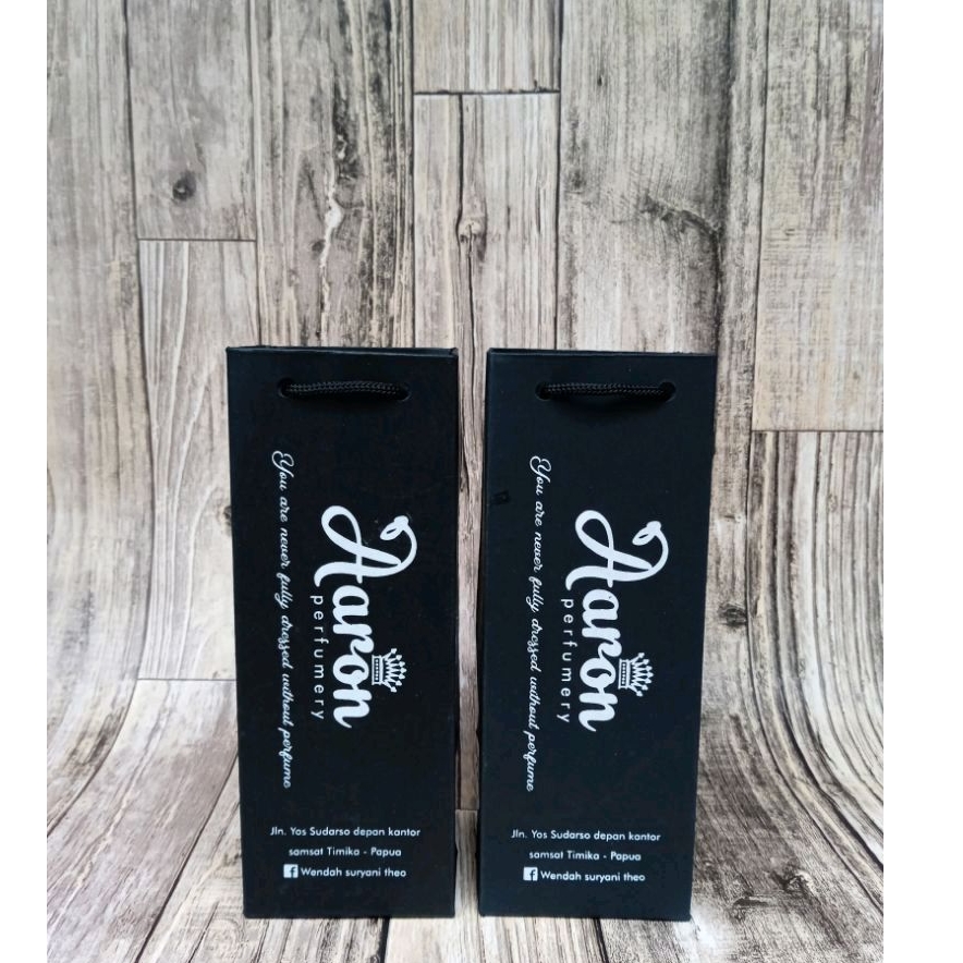 

Paperbag parfum warna hitam rapi,elegant uk P9xL9xT15 custom cetak free desain