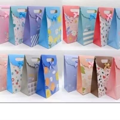

PAPER BAG TUTUP MOTIF PITA UKURAN S 12*16*6