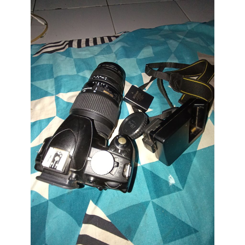 Nikon D3100 + lensa Tele Sigma 70-300mm