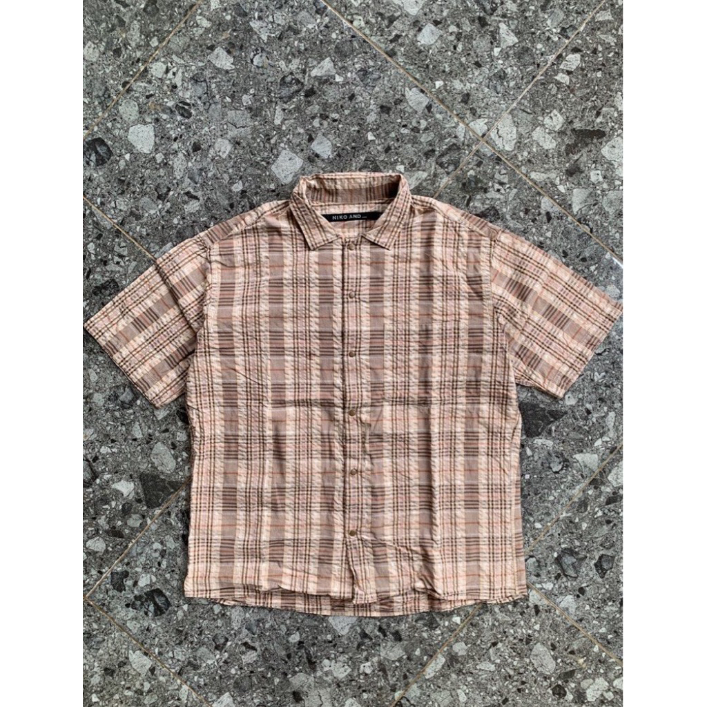 Niko and… plaid shirt